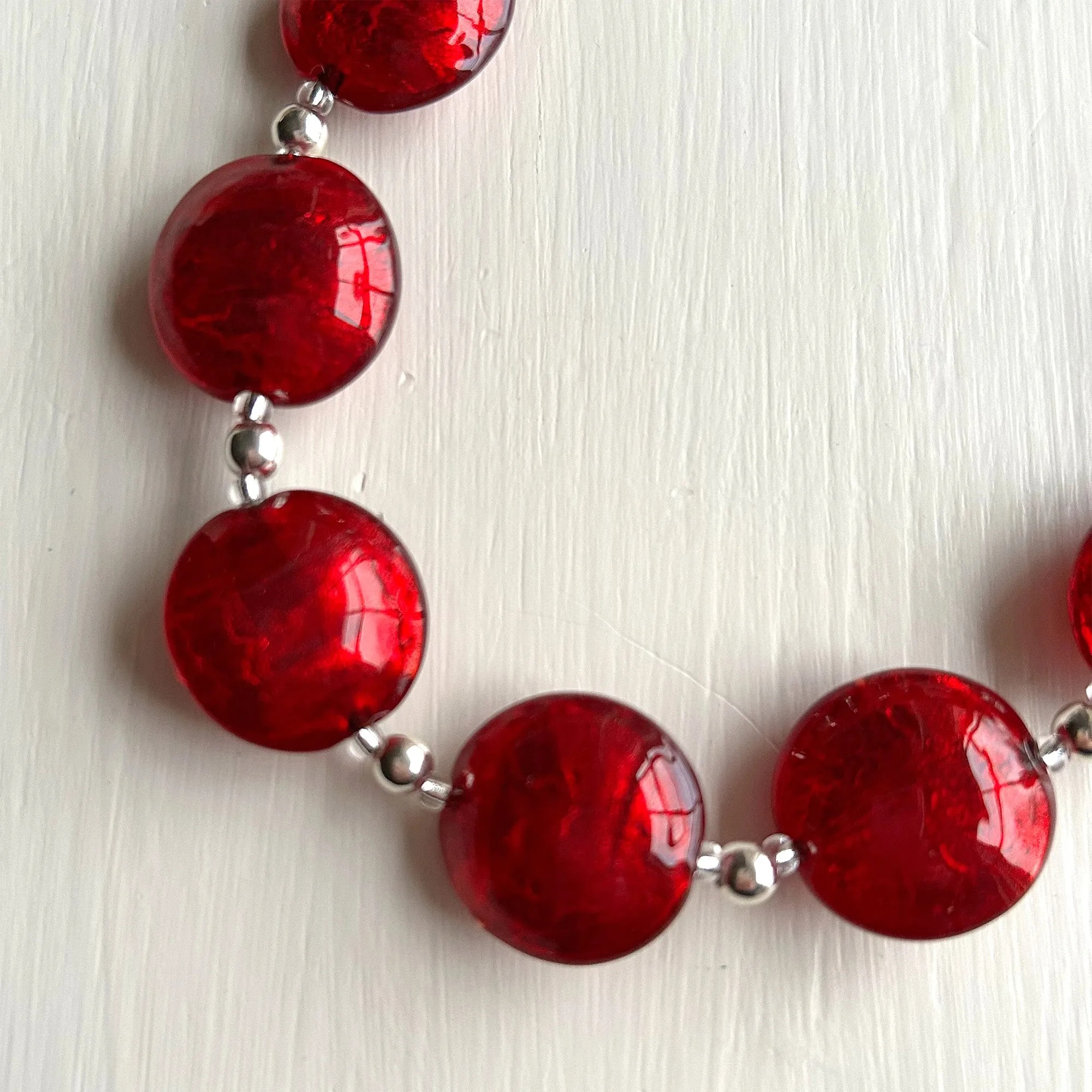 Necklace with red Murano glass medium lentil beads on silver