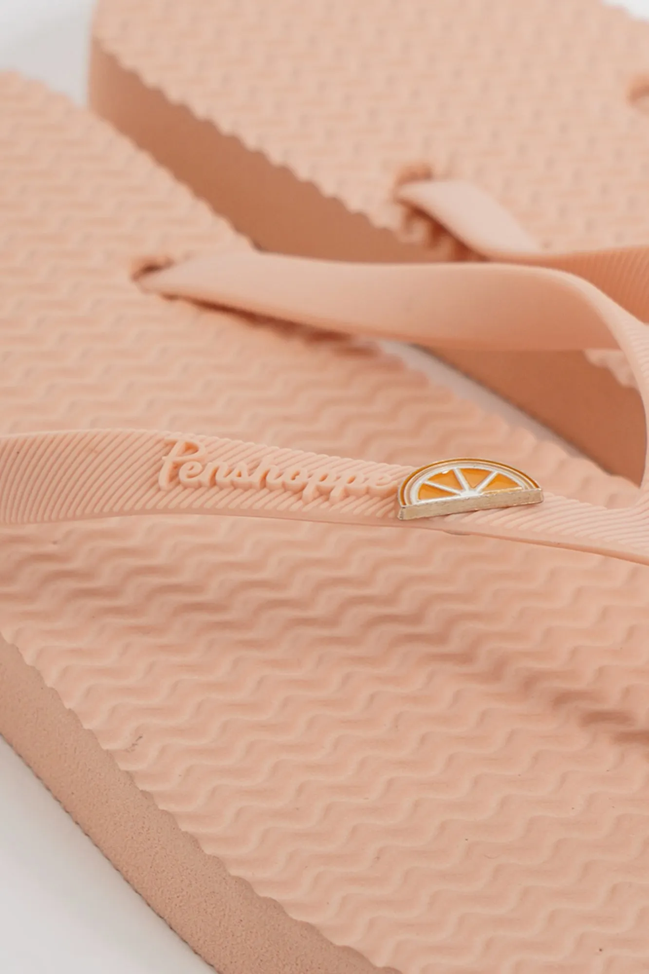 Women's Textured Flip Flops with Metal Pin